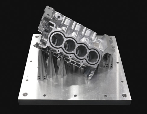 Large-sized (W424 x D317 x H339 mm) near net shape built parts drastically shorten the necessary machining time. (The datum surface for machining can be defined during laser processing using a function unique to the hybrid metal 3D printer.)